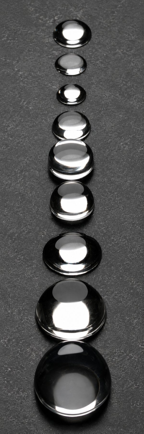 Row of silicone dome lenses arranged by height