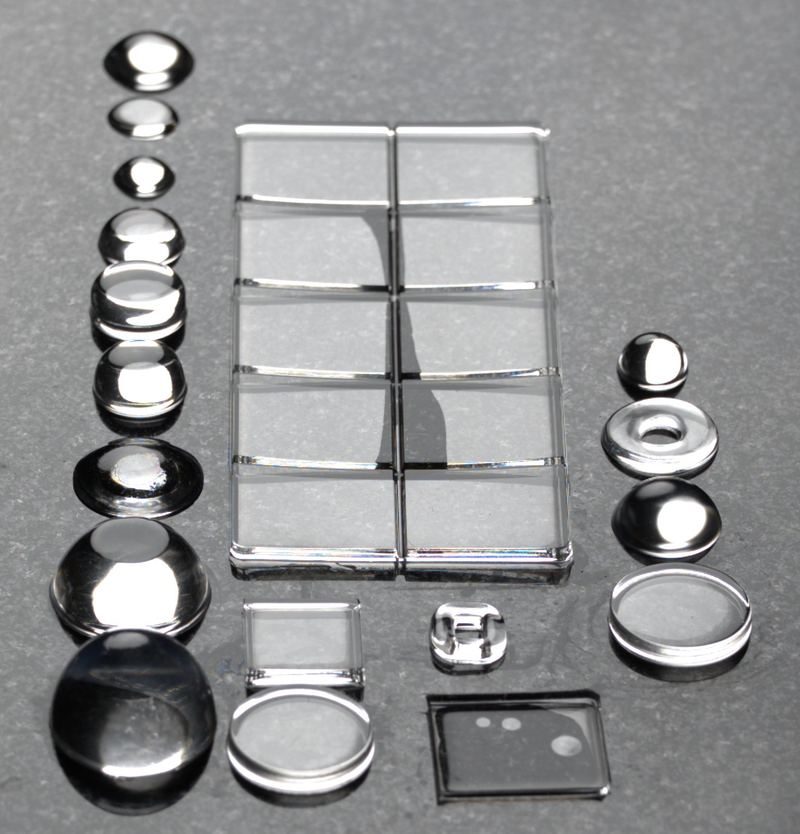 Full range of silicone dome lenses, windows, and microlens arrays arranged by size