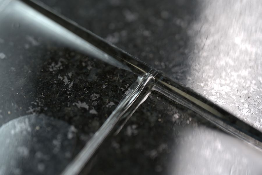 Macro inspection of optical window edge tolerance